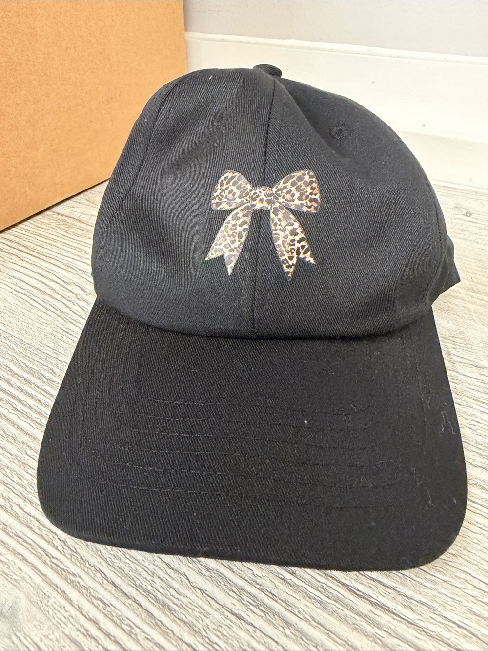Black Baseball Cap with Leopard Bow Accent